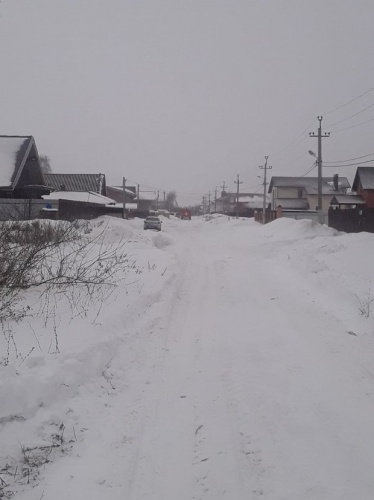  В Казани две пожарные машины застряли в снегу, пытаясь проехать к дому2